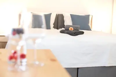 Ein Bett oder Betten in einem Zimmer der Unterkunft Gästezimmer ROSS