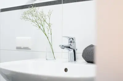 Ein Badezimmer in der Unterkunft Gästezimmer ROSS