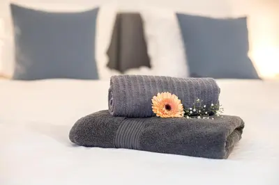 Ein Bett oder Betten in einem Zimmer der Unterkunft Gästezimmer ROSS