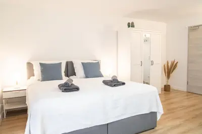 Ein Bett oder Betten in einem Zimmer der Unterkunft Gästezimmer ROSS