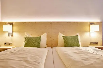 Ein Bett oder Betten in einem Zimmer der Unterkunft Zum Turm - Apartments und Gästezimmer