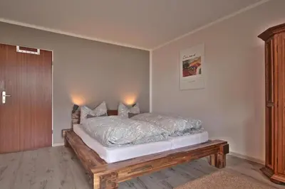 Ein Bett oder Betten in einem Zimmer der Unterkunft Bergkristall