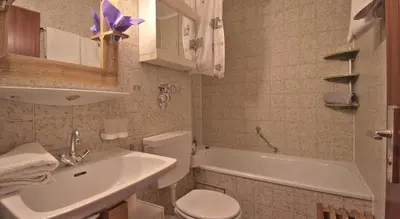Ein Badezimmer in der Unterkunft Bergkristall