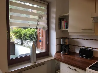 Küche/Küchenzeile in der Unterkunft Wohnung direkt am Tegernsee mit XL-Terrasse