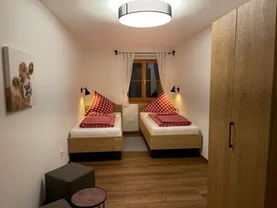 Ein Bett oder Betten in einem Zimmer der Unterkunft Ilgerhof Ferienwohnungen