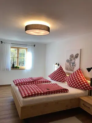 Ein Bett oder Betten in einem Zimmer der Unterkunft Ilgerhof Ferienwohnungen
