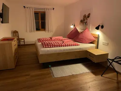 Ein Bett oder Betten in einem Zimmer der Unterkunft Ilgerhof Ferienwohnungen