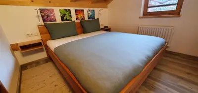 Ein Bett oder Betten in einem Zimmer der Unterkunft Ferienhaus Happyplace