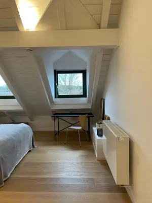 Ein Bett oder Betten in einem Zimmer der Unterkunft Gemütliches Loft