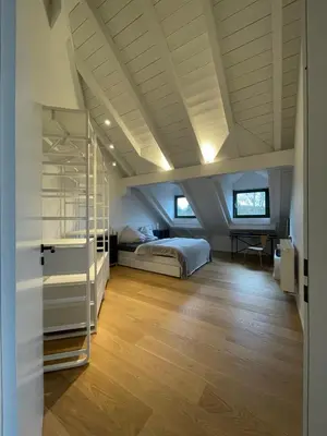 Ein Bett oder Betten in einem Zimmer der Unterkunft Gemütliches Loft