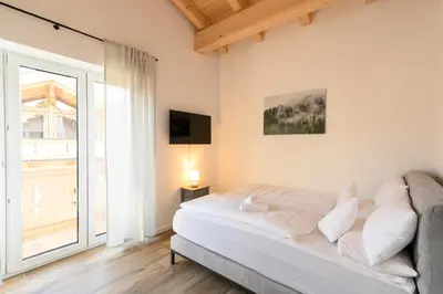 Ein Bett oder Betten in einem Zimmer der Unterkunft Alpjuwel