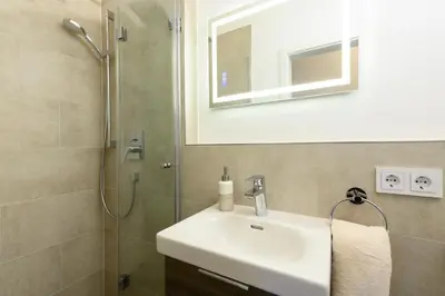 Ein Badezimmer in der Unterkunft Alpjuwel