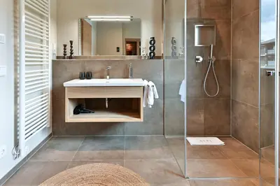 Ein Badezimmer in der Unterkunft Boutique ChaletS Alpi mit Sauna & Kino