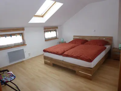 Ein Bett oder Betten in einem Zimmer der Unterkunft Schöne helle Ferienwohnung