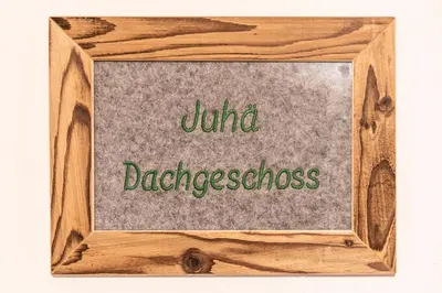 Ein Zertifikat, Auszeichnung, Logo oder anderes Dokument, das in der Unterkunft Alpenrose Ferienwohnungen ausgestellt ist