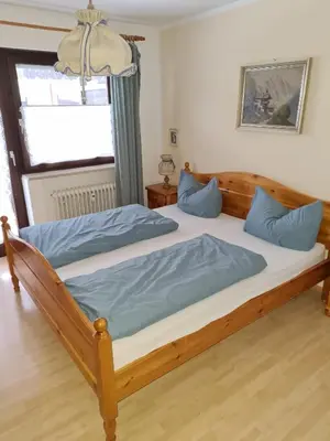 Ein Bett oder Betten in einem Zimmer der Unterkunft Bergdiamant