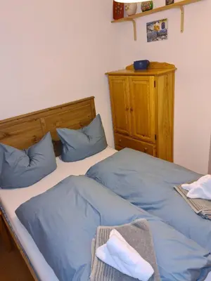 Ein Bett oder Betten in einem Zimmer der Unterkunft Bergdiamant