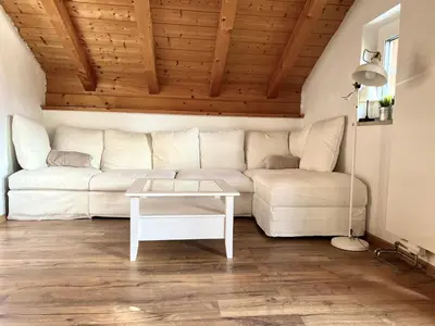 Ein Sitzbereich in der Unterkunft Gasthof Königstand