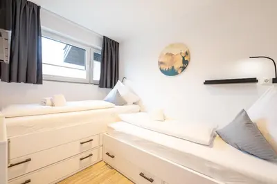 Ein Bett oder Betten in einem Zimmer der Unterkunft Bergnest