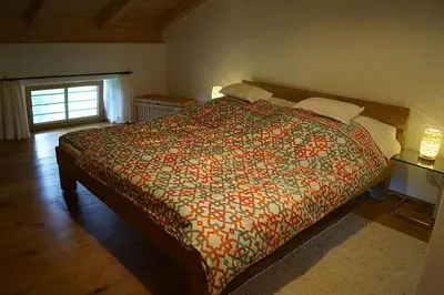 Ein Bett oder Betten in einem Zimmer der Unterkunft Fembacher Alm