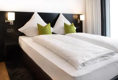 Ein Bett oder Betten in einem Zimmer der Unterkunft SOB Hotel by WMM Hotels