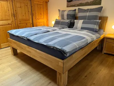 Ein Bett oder Betten in einem Zimmer der Unterkunft Ferienwohnung Gruberhof