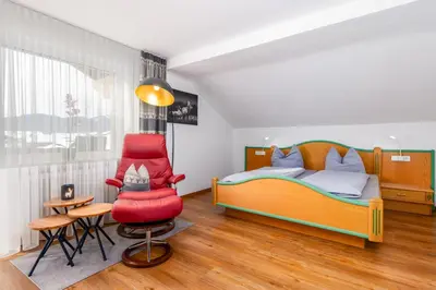 Ein Bett oder Betten in einem Zimmer der Unterkunft Wallgauer Hof
