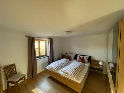 Ein Bett oder Betten in einem Zimmer der Unterkunft Ferienwohnung Obstgarten