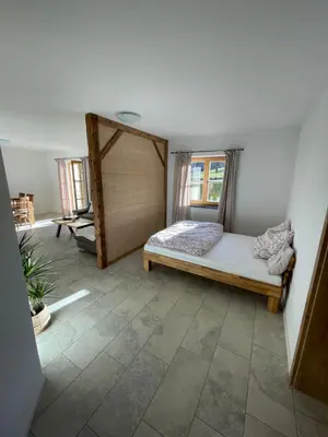 Ein Bett oder Betten in einem Zimmer der Unterkunft Ferienwohnung Obstgarten