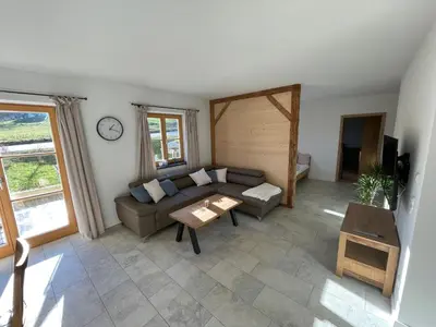 Ein Sitzbereich in der Unterkunft Ferienwohnung Obstgarten