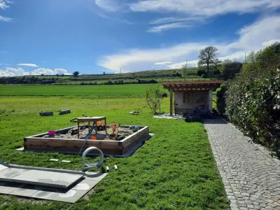 Ein Garten an der Unterkunft Thallerhof