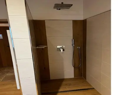 Ein Badezimmer in der Unterkunft Thallerhof