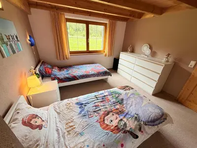 Ein Bett oder Betten in einem Zimmer der Unterkunft Casa Cubana - Schönes und komfortables Ferienhaus am Waldrand