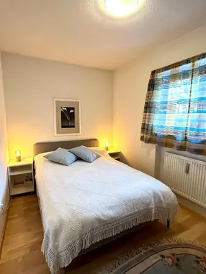 Ein Bett oder Betten in einem Zimmer der Unterkunft FeWo Flair