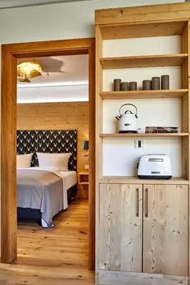 Ein Bett oder Betten in einem Zimmer der Unterkunft Parkchalet