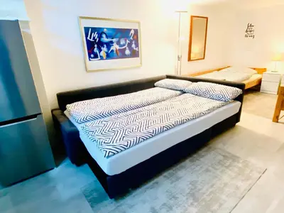 Ein Bett oder Betten in einem Zimmer der Unterkunft Practical Loft Comfort near Munich
