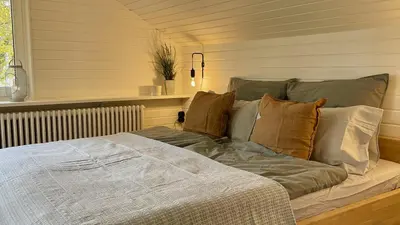 Ein Bett oder Betten in einem Zimmer der Unterkunft Quiet 2 room garden loft with terrace