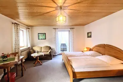 Ein Bett oder Betten in einem Zimmer der Unterkunft Pension Luger
