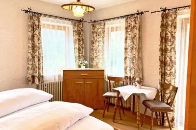 Ein Bett oder Betten in einem Zimmer der Unterkunft Pension Luger