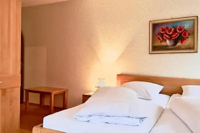 Ein Bett oder Betten in einem Zimmer der Unterkunft Pension Luger