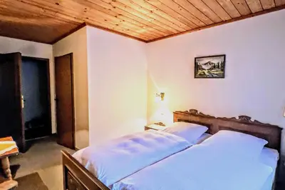Ein Bett oder Betten in einem Zimmer der Unterkunft Pension Luger