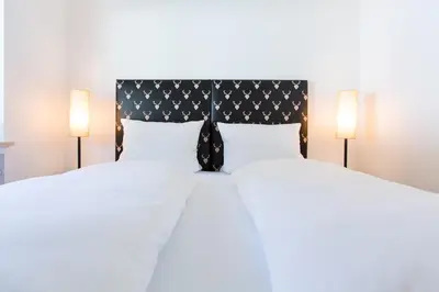Ein Bett oder Betten in einem Zimmer der Unterkunft Alpenoase