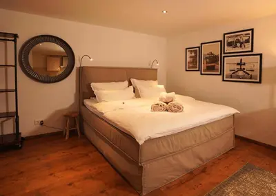 Ein Bett oder Betten in einem Zimmer der Unterkunft Ferienwohnung in alter Brauerei