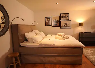 Ein Bett oder Betten in einem Zimmer der Unterkunft Ferienwohnung in alter Brauerei