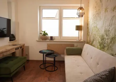 Ein Sitzbereich in der Unterkunft Ferienwohnung in alter Brauerei