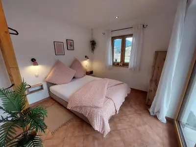 Ein Bett oder Betten in einem Zimmer der Unterkunft Apartment Kofelblick