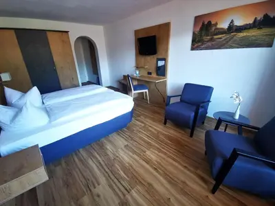 Ein Bett oder Betten in einem Zimmer der Unterkunft Gasthof & Hotel Zur Post
