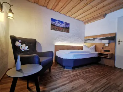 Ein Bett oder Betten in einem Zimmer der Unterkunft Gasthof & Hotel Zur Post