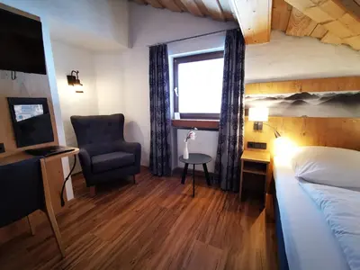 Ein Bett oder Betten in einem Zimmer der Unterkunft Gasthof & Hotel Zur Post