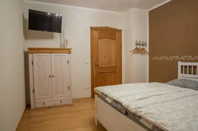 Ein Bett oder Betten in einem Zimmer der Unterkunft Bio-Bauernhof Eisele